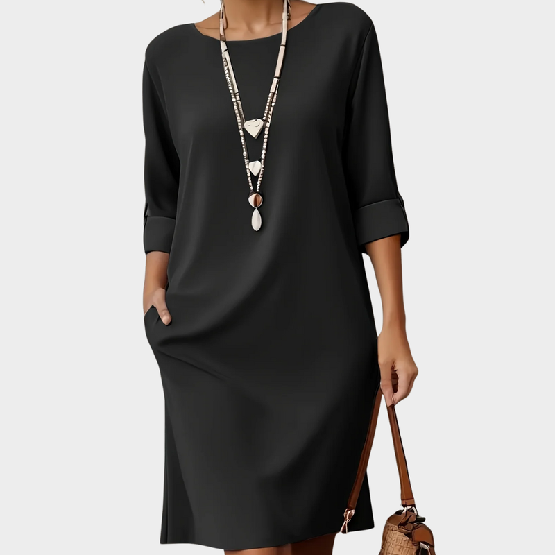Linen Shift Dress for Women with 3/4 Sleeves and Side Pockets in Black, studio front view