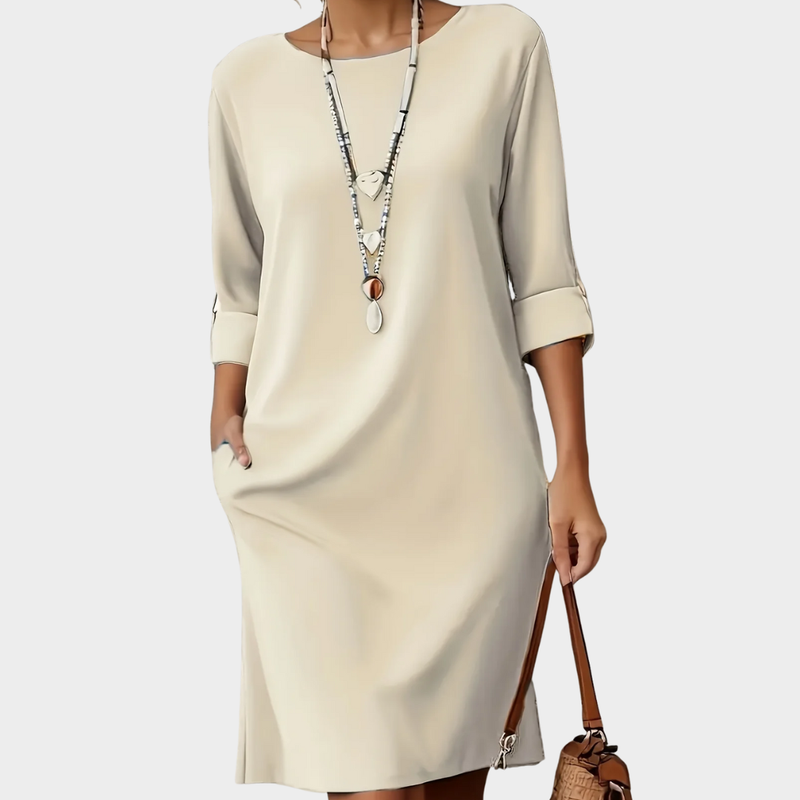 Linen Shift Dress for Women with 3/4 Sleeves and Side Pockets in Apricot, studio front view