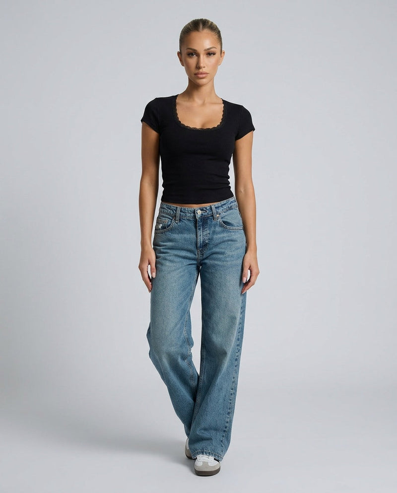 Baggy Wide Leg Jeans for Women with Five Pockets and Washed Denim in Blue, walking view