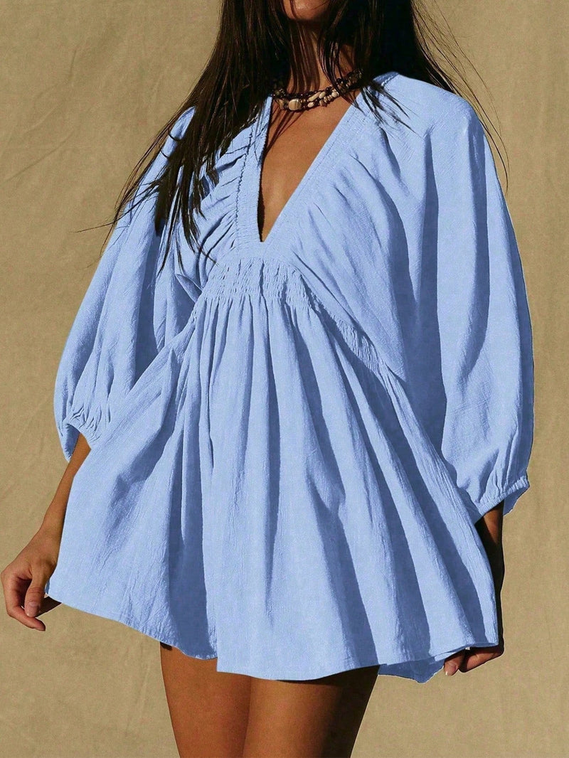 Balloon Sleeve Mini Dress for Women with Deep V-Neck and Smocked Waist in Blue, close-up