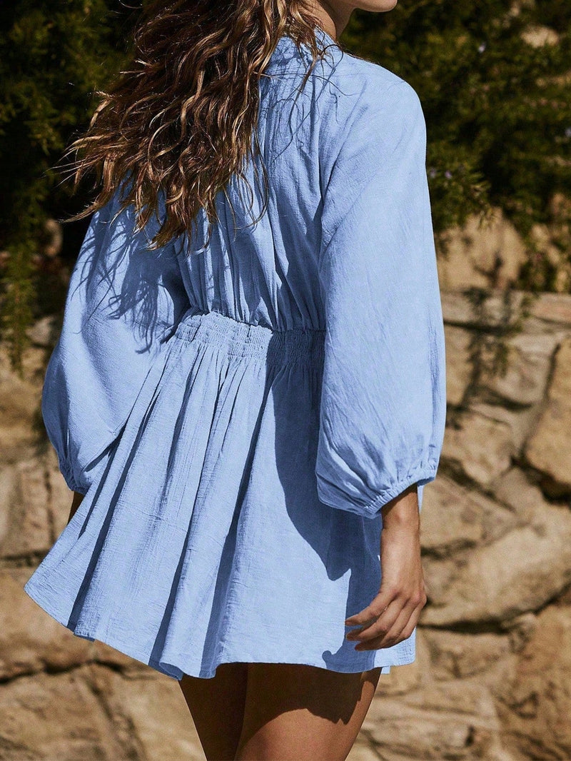 Balloon Sleeve Mini Dress for Women with Deep V-Neck and Smocked Waist in Blue, side view