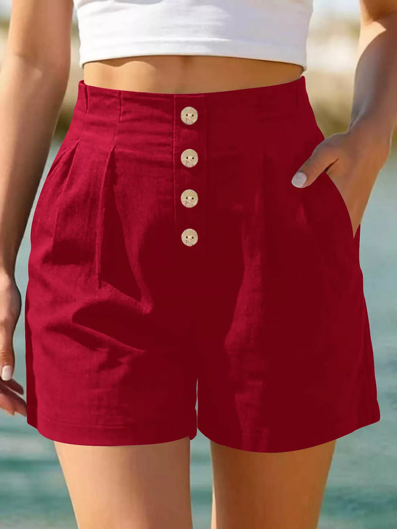 Button Front High Waisted Shorts for Women with Pleats and Side Pockets in Red, front view