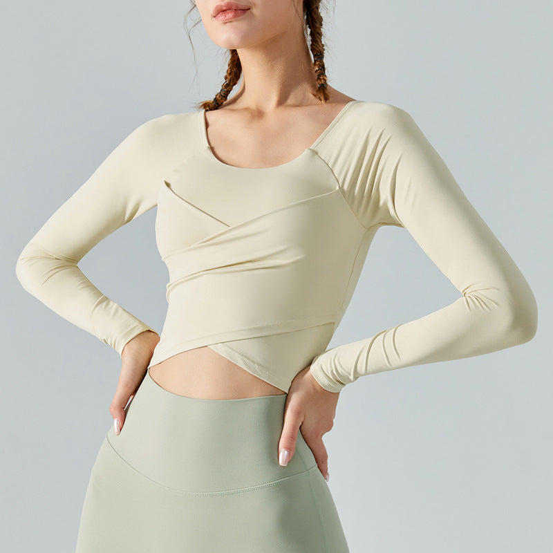 Criss Cross Long Sleeve Gym Top for Women with Scoop Neck and Cropped Hem in Cream, front view 3