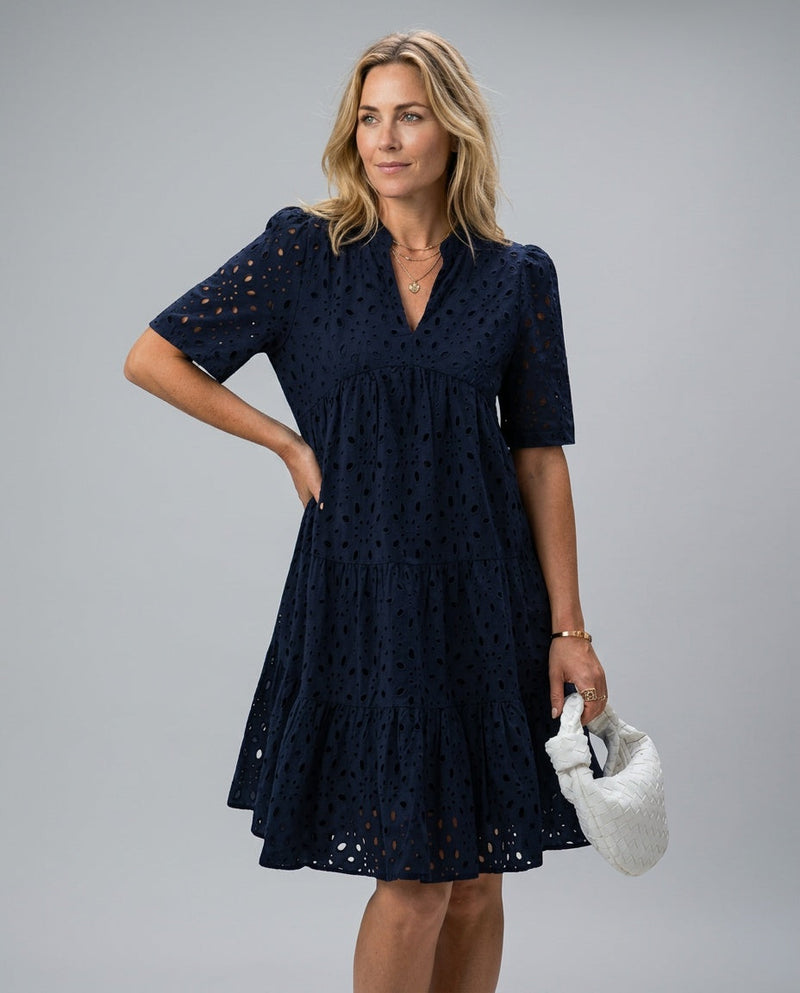Short Sleeve A-Line Dress for Women with Eyelet Lace and Ruffle Hem in Navy, studio front view
