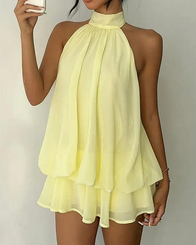 Halter Neck Mini Dress for Women with Open Back and Tiered Ruffle Hem in Yellow, front view