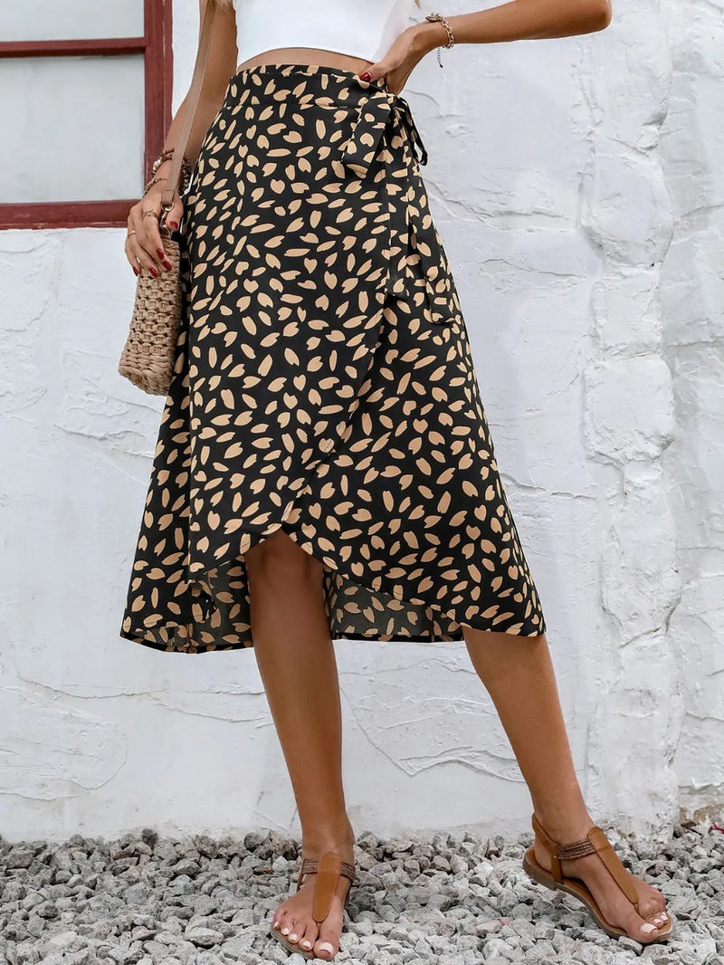 Leopard Print Wrap Midi Skirt for Women with Tie Waist and Tulip Hem in Black, front view