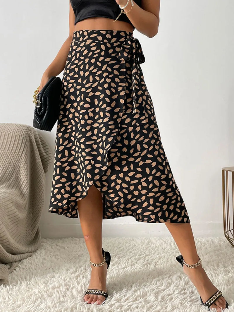 Leopard Print Wrap Midi Skirt for Women with Tie Waist and Tulip Hem in Black, front view 3