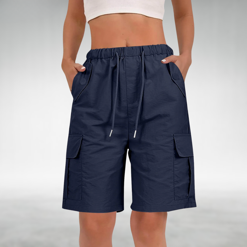Long Stretch Cargo Shorts for Women with Drawstring Waist and Flap Pockets in Navy Blue, front view