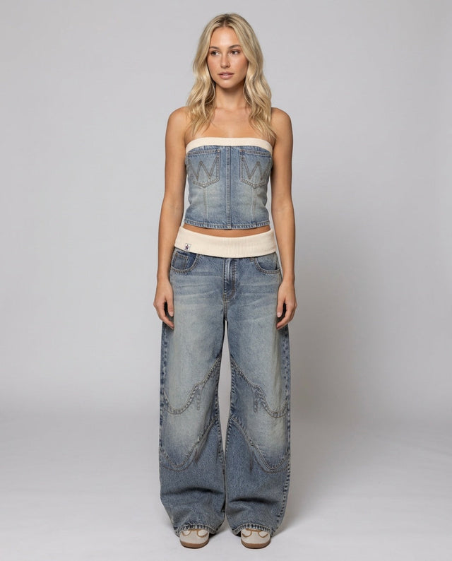 Low Rise Baggy Jeans for Women with Fold Over Waistband and Curved Seams in Light Blue, front view