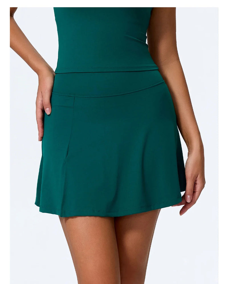 Mini Tennis Skirt for Women with Built-In Shorts and Front Slit in Dark Green, front view