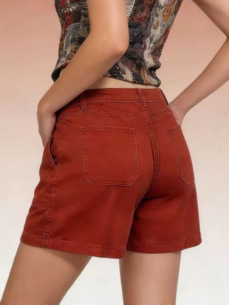 Denim Shorts for Women with Patch Pockets and Mid Rise in Rust, back view