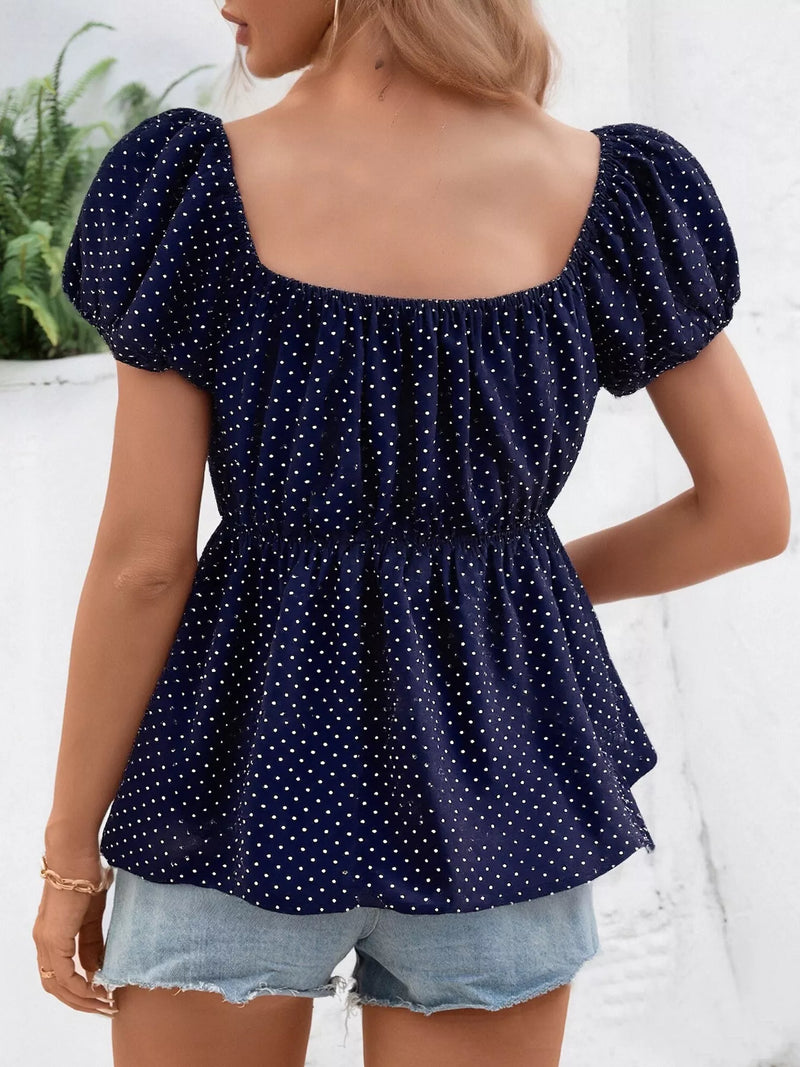 Polka Dot Top for Women with Smocked Peplum Waist and Puff Sleeves in Navy, back view
