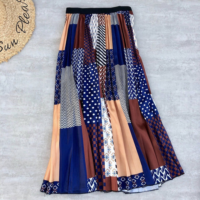 Printed Pleated Midi Skirt for Women with Elastic Waist and Bold Patterns in Blue Patchwork, flat lay