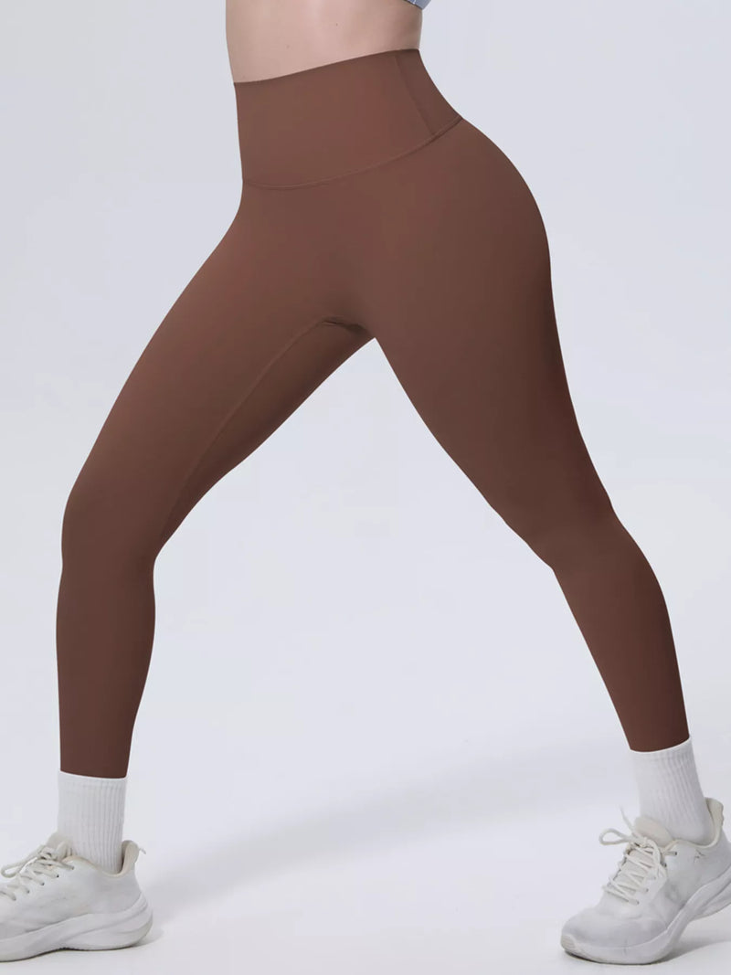 Seamless Gym Leggings for Women with High Waist and Moisture-Wicking Knit in Brown, walking view
