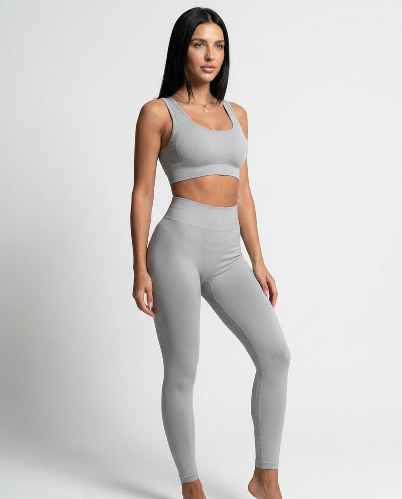 Sculpting Gym Leggings for Women with Seamless Knit and High Waist in Grey, three-quarter view