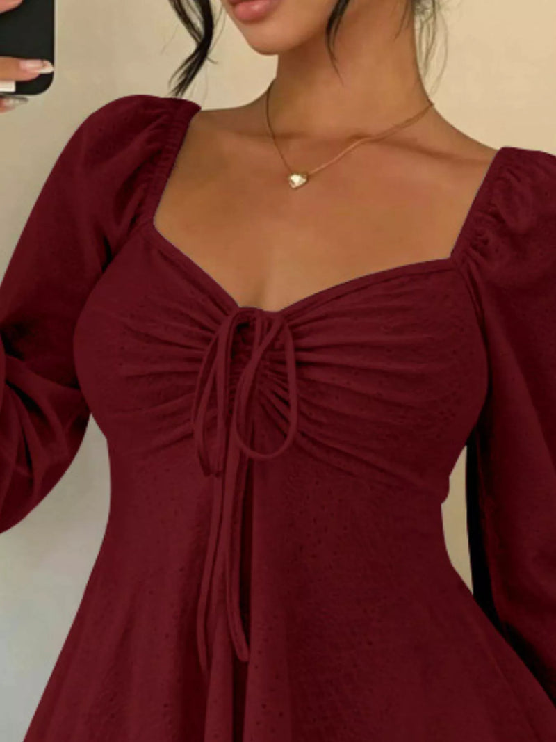 Long Sleeve Tie Front Top for Women with Sweetheart Neck and Peplum Hem in Burgundy, close-up