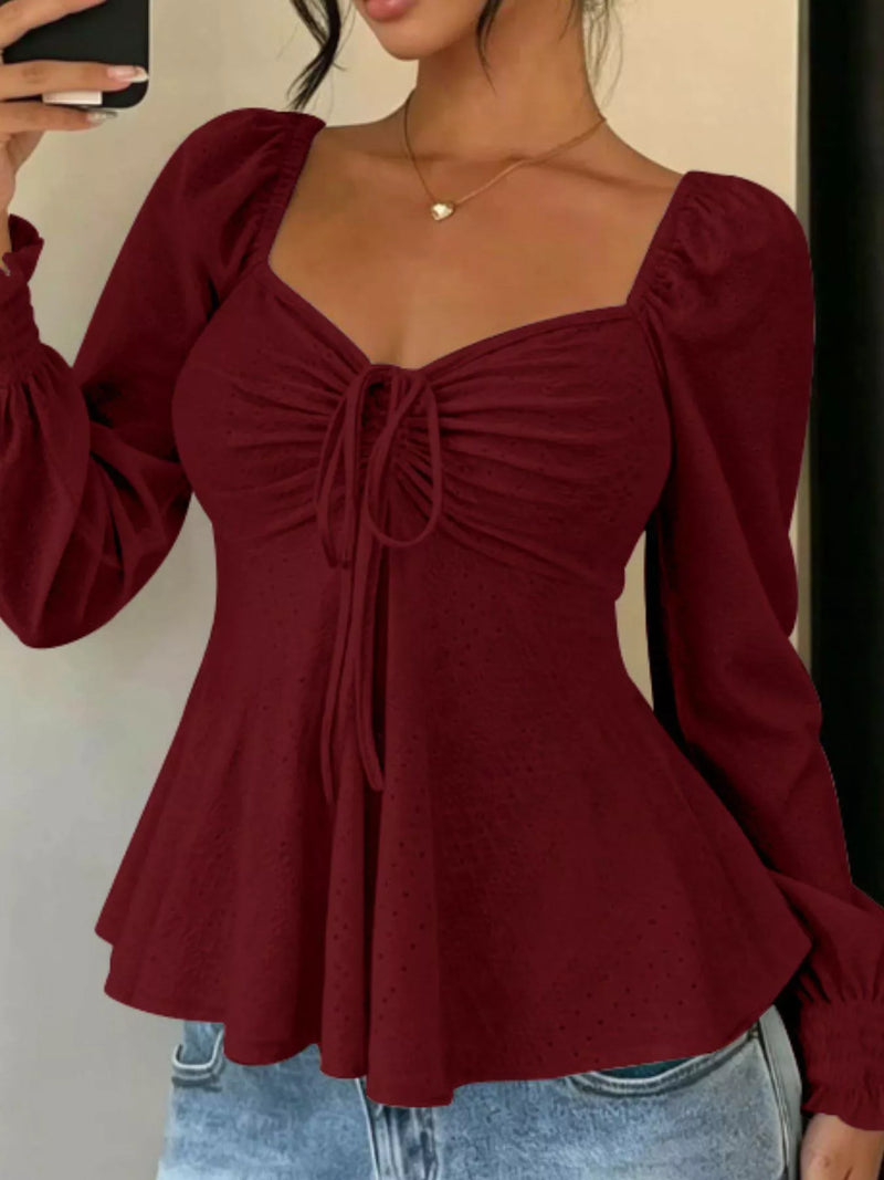 Long Sleeve Tie Front Top for Women with Sweetheart Neck and Peplum Hem in Burgundy, front view