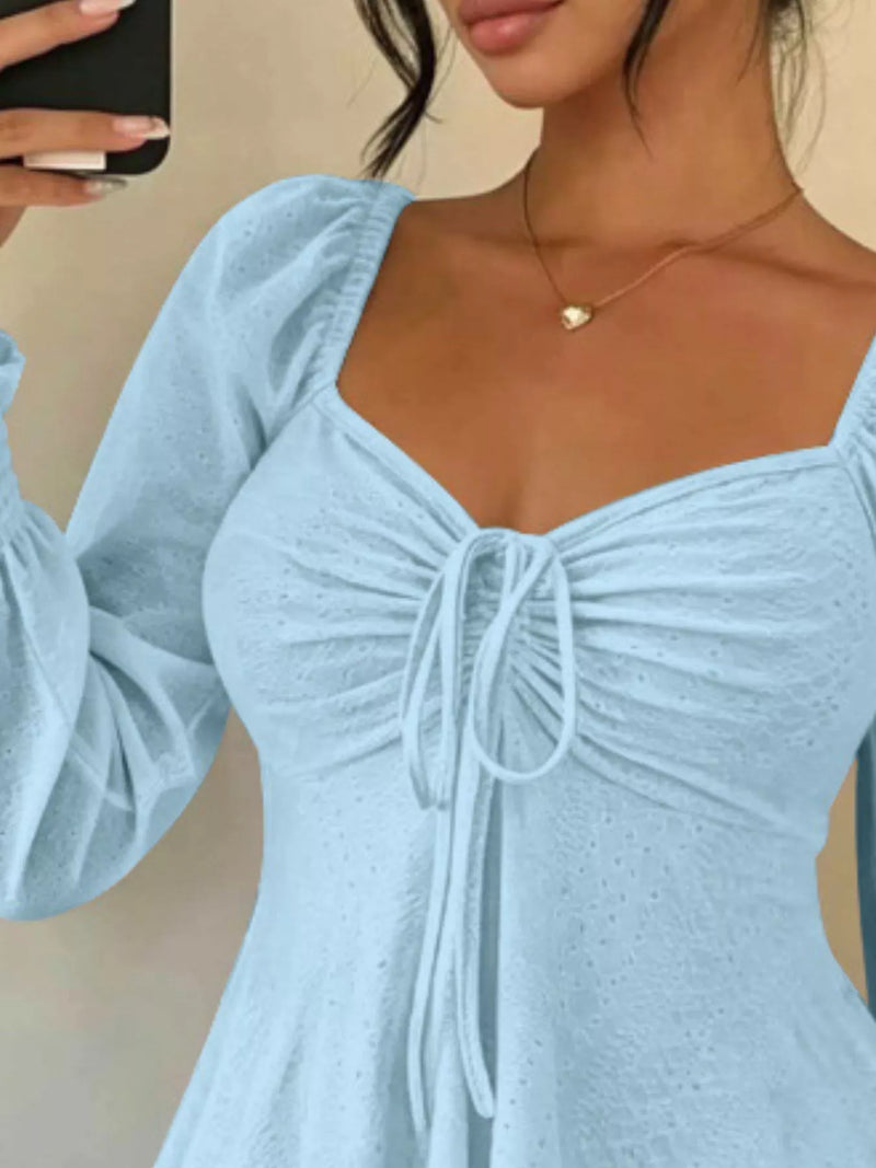 Long Sleeve Tie Front Top for Women with Sweetheart Neck and Peplum Hem in Sky Blue, close-up