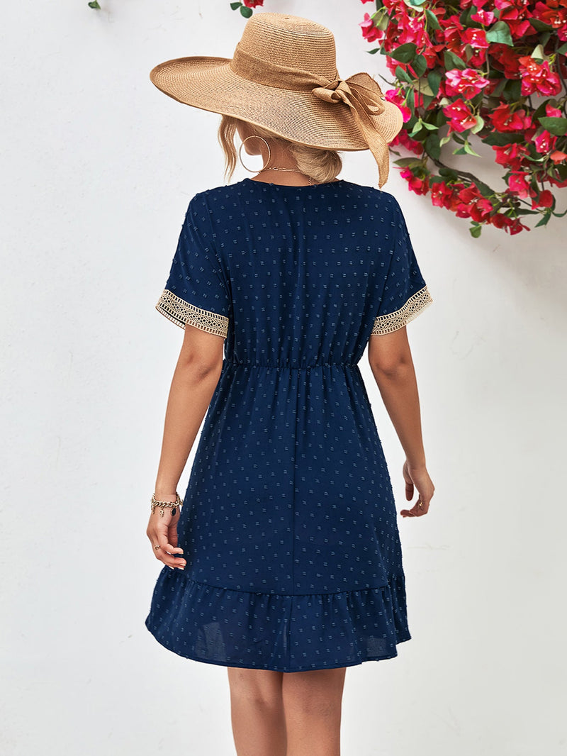 Swiss Dot V-Neck Mini Dress for Women with Lace Trim and Short Sleeves in Dark Blue, back view