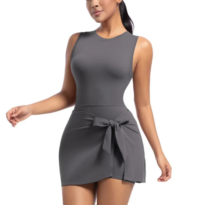 Tennis Workout Dress for Women with Built-In Shorts and Tie Wrap Skirt in Charcoal, front view