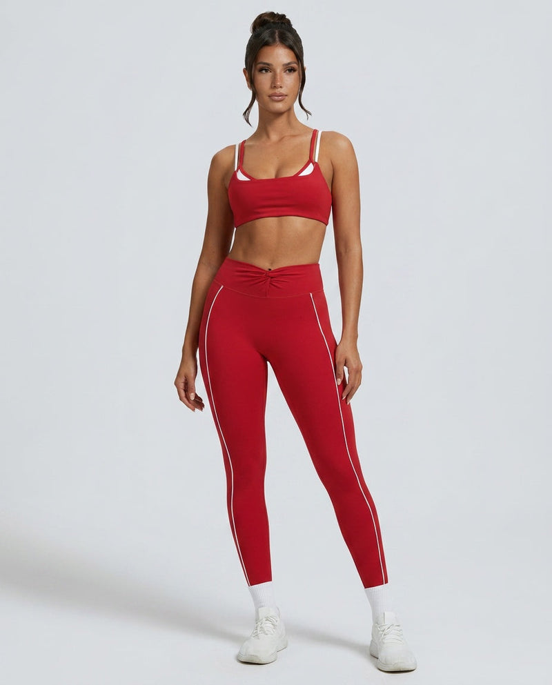 High Waisted Gym Leggings for Women with Twist Front and Contrast Piping in Red, front view