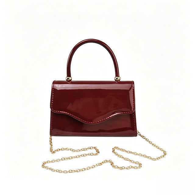 Women's Patent Finish Single Strap Evening Clutch Bag in Burgundy, front view