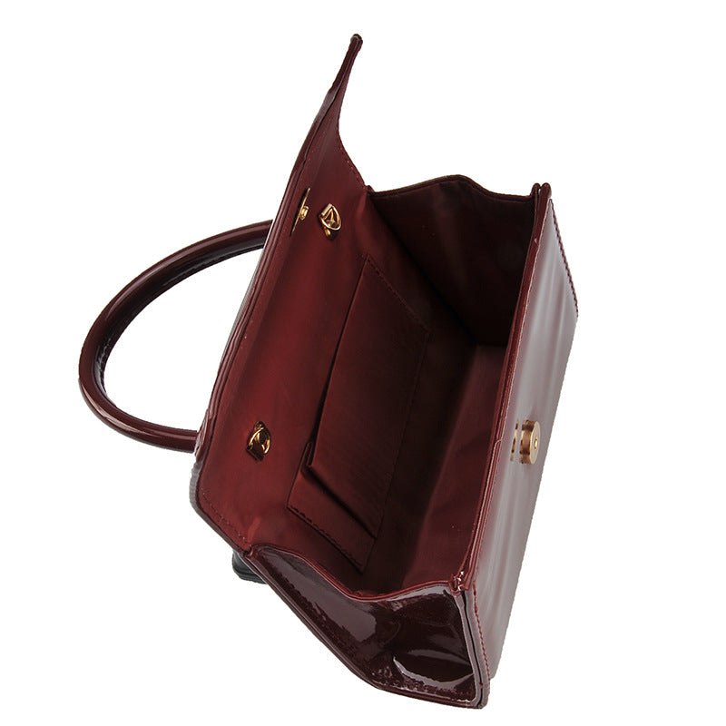 Women's Patent Finish Single Strap Evening Clutch Bag in Burgundy, detail