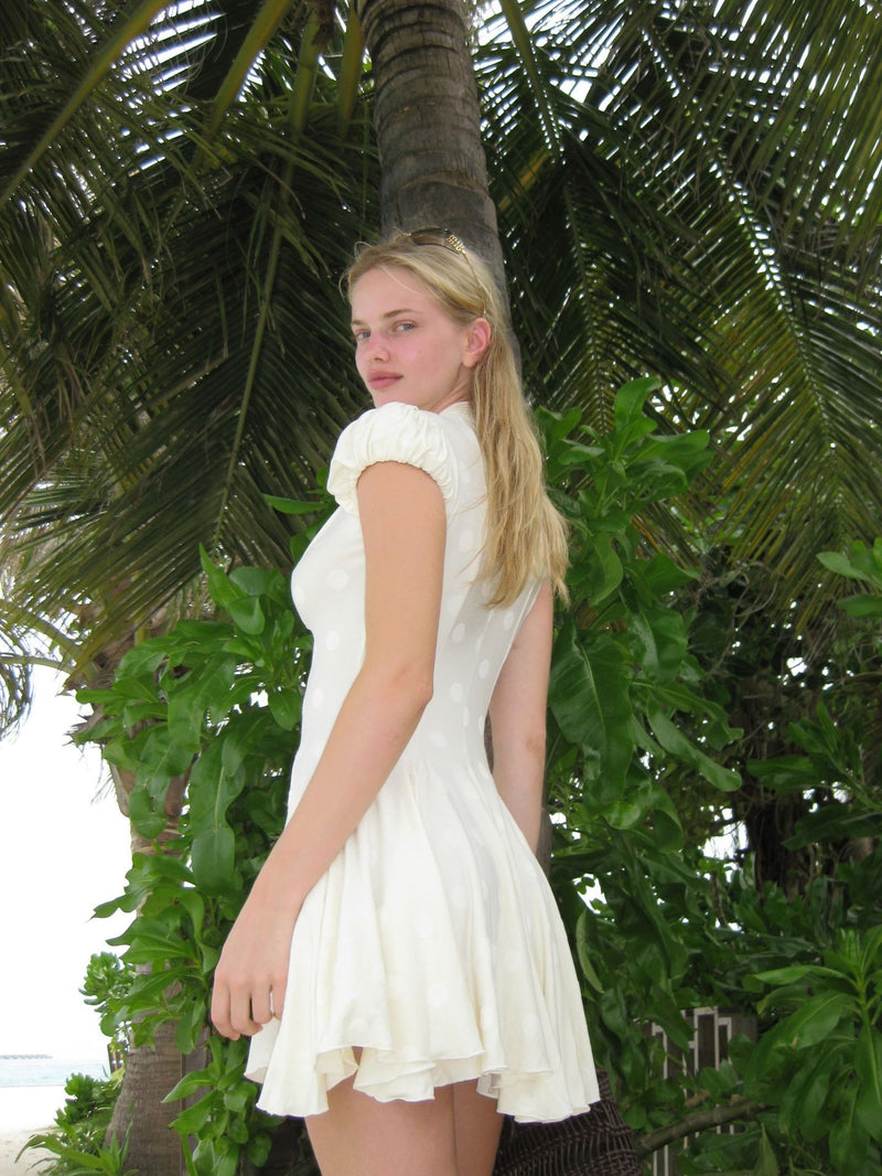 Women's V-Neck Puff Sleeve Ruffle Hem Short Dress in Cream, back view
